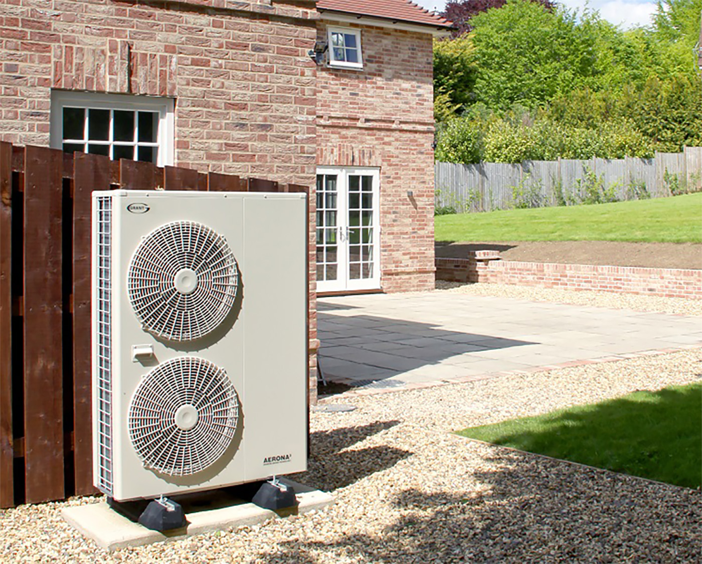 Grant’s Aerona3 13kW and 17kW air source heat pumps both hold Quiet Mark certification. Here, the external unit has been installed behind fencing for even greater acoustic protection